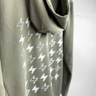 Closeup of olive green Ignite hooded jacket by STORY SPARK