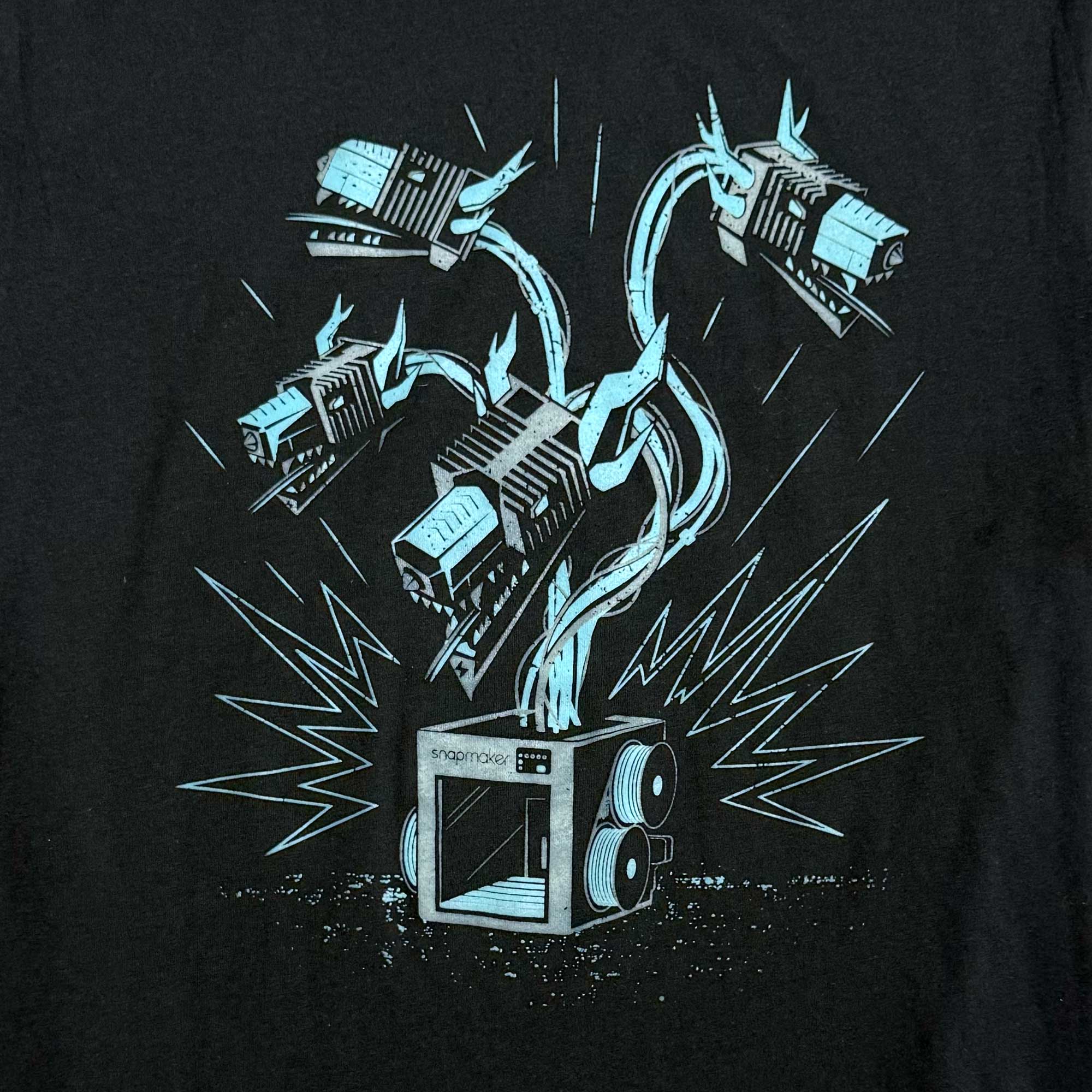 Closeup of Story Spark Snapmaker Hydra t-shirt